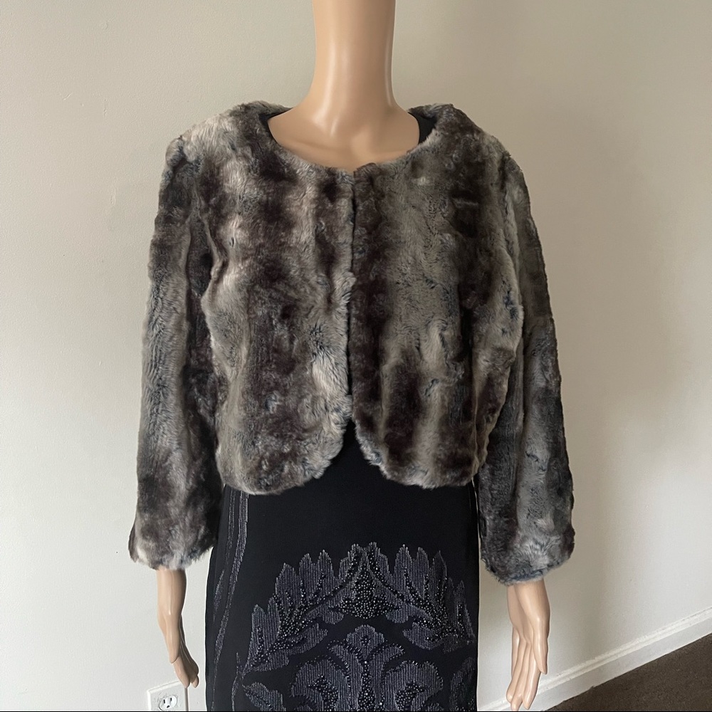 Free people size M8/10, short faux fur jacket.